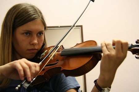 Hannah practices violin